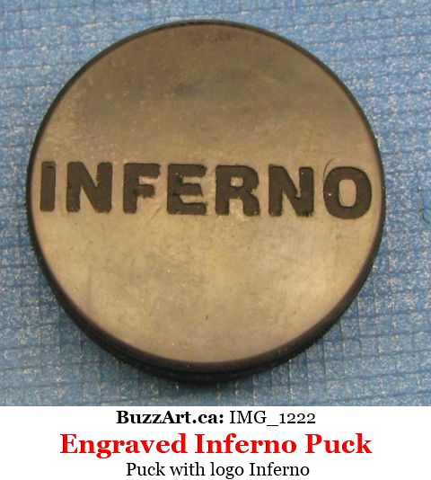 Team Inferno engraved on hockey puck - not good for playing with as to deep engraving